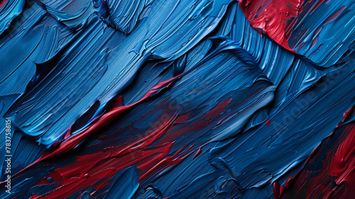 Blue and red paint strokes blending together on a textured surface.