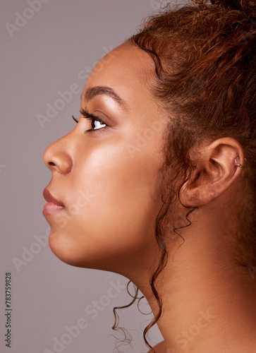 Curls, hair and profile of black woman in studio with confidence, pride and natural beauty. Cosmetics, curls and hairstyle on female model with growth, style and keratin treatment on pink background