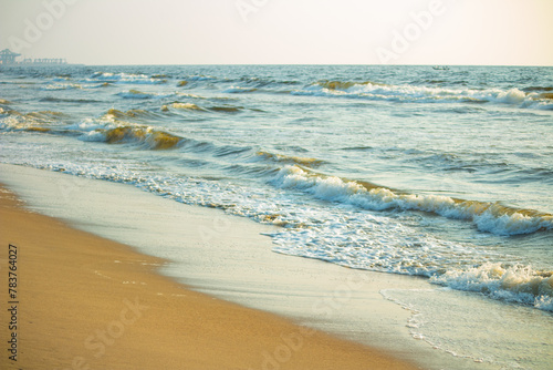 Beach sand and Waves. . The Beautiful Marina Beach, a natural urban beach in Chennai, Tamil Nadu, South India, India, along the Bay of Bengal. the second longest urban beach in the world photo