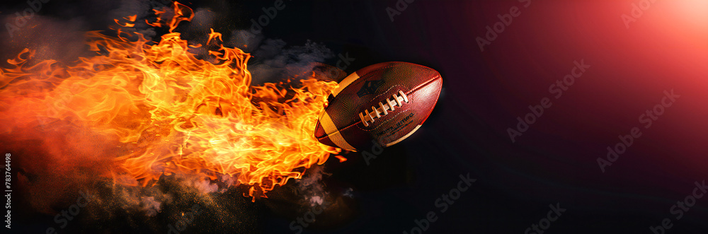 American football ball with bright flame flying on black background 