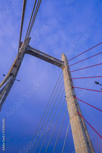 Red and white bridge construction, Ambon, Indonesia
 photo