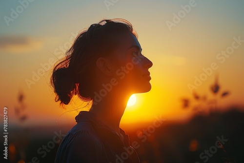 girl watching the sunset