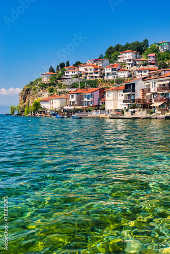 Lake Ohrid, North Macedonia, April 13 2024. Mountain range and peninsula in distance. Ohrid Lake, Macedonia, Europe. The clear mesmerizing waters of lake Ohrid with a beautiful view. 