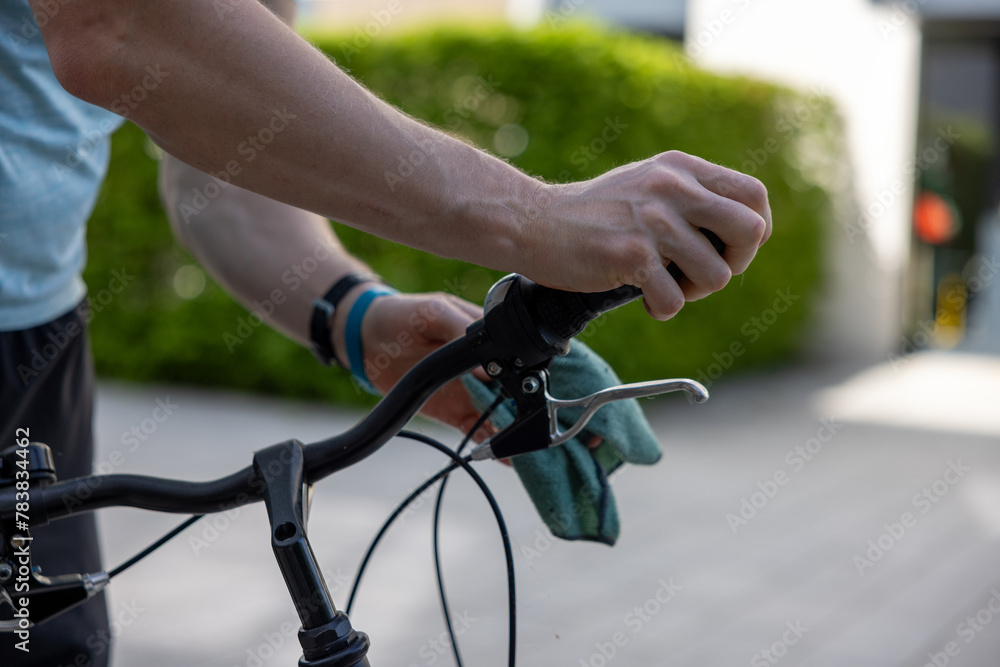 Bicycle repair and cleaning close up hand and details