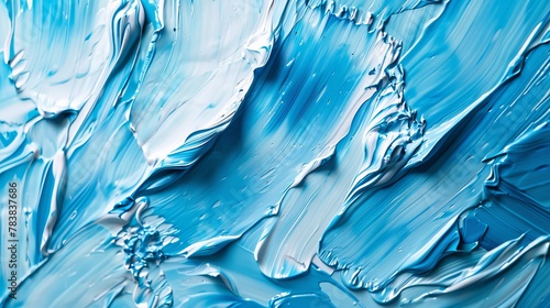 A close-up of beautiful brushstrokes on a blue background, captured in rich oil paint