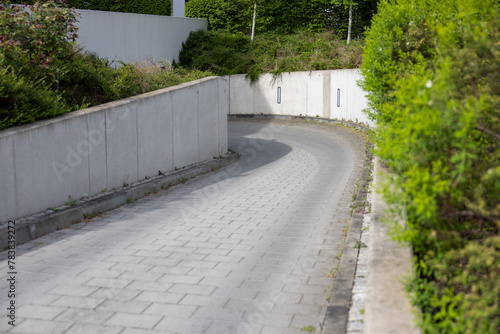 Garage entrance road with road lights