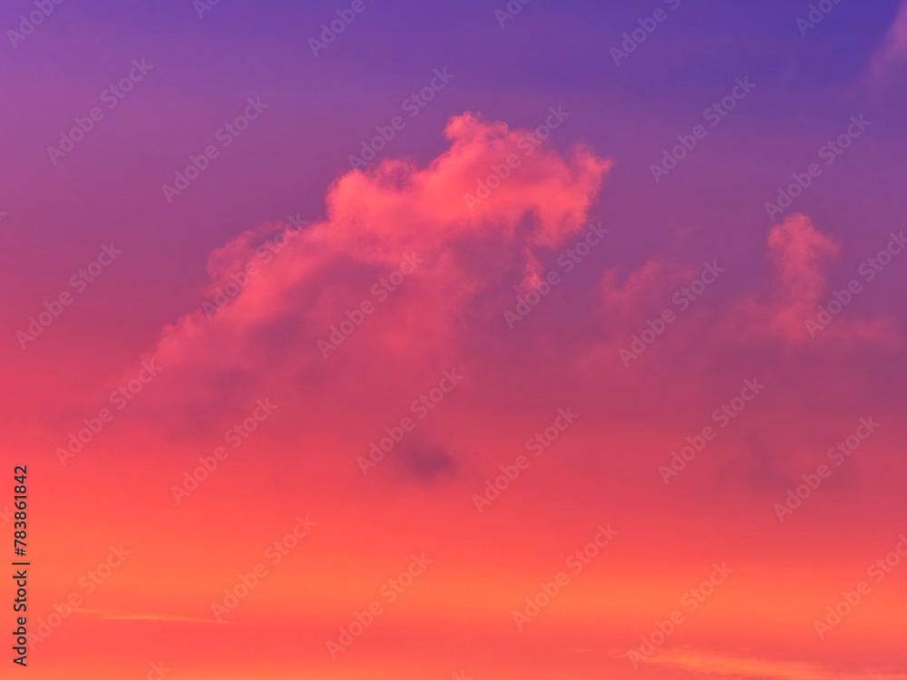 A stormy spring sunrise over the jurassic coastline with fiery purple and gold tinged clouds