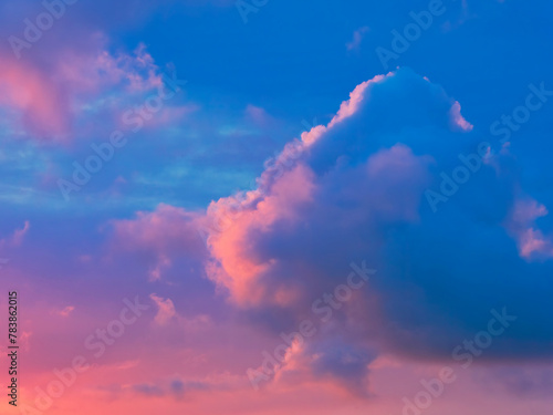 A stormy spring sunrise over the jurassic coastline with fiery purple and gold tinged clouds