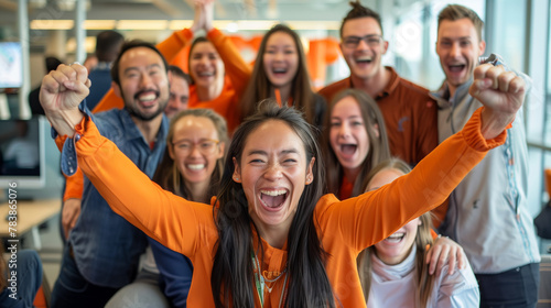 Energetic Team Celebration, United Colleagues in Vibrant Orange Cheers