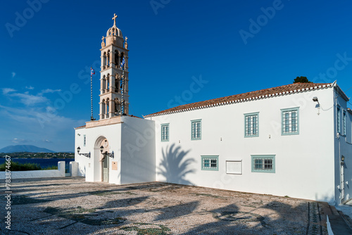 Obraz na płótnie The church of Saint Nicholas (Agios Nikolaos), with its cobbled forecourt, the metropolitan church of Spetses island, in Greece, Europe, built in 1700. w salonie