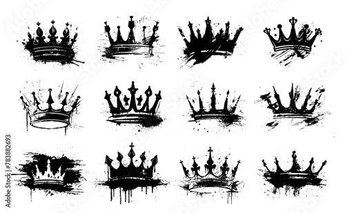 Grunge-style crowns with ink splatters. Set of vector black crown silhouettes with paint splashes and blots