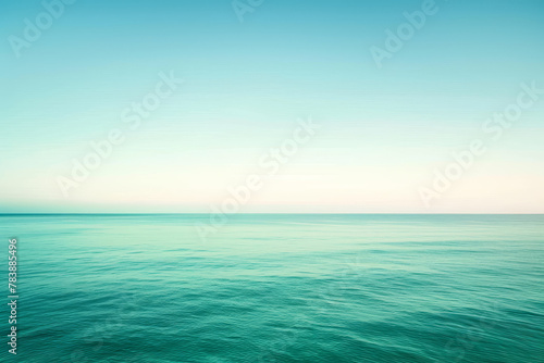 The ocean is calm and blue  with no visible waves