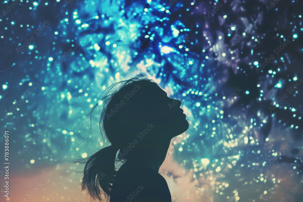 A woman is looking up at the stars in the sky. Concept of wonder and awe at the vastness of the universe. The woman's gaze is directed upwards, as if she is trying to reach out A woman is looking up at the stars in the sky. Concept of wonder and awe at the vastness of the universe. The woman's gaze is directed upwards, as if she is trying to reach out