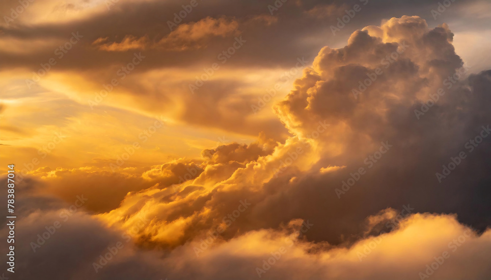 Fototapeta premium Golden sunlight piercing through dramatic clouds during sunset, creating an ethereal glow.