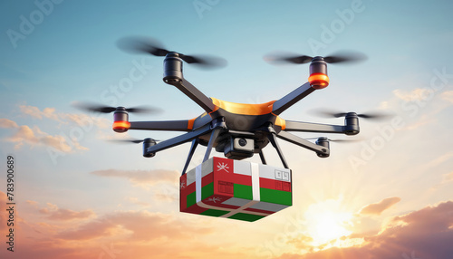 A drone delivers a box with a Oman flag. The concept of delivering goods, food from stores to the client’s home in the Oman.
