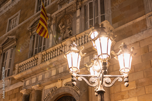 Barcelona, Catalonia, Spain: Palau de la Generalitat de Catalunya, balcony and street lamp, Placa de Sant Jaume, night scene