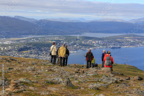 Tourists on the mountain Fløya with a view towards Tromsø city