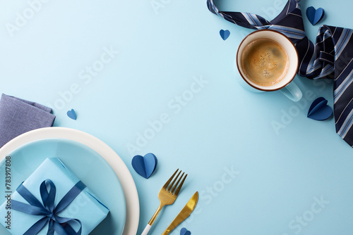 Father's day breakfast setup. Top view of morning coffee and tie with gifts on a pale blue background