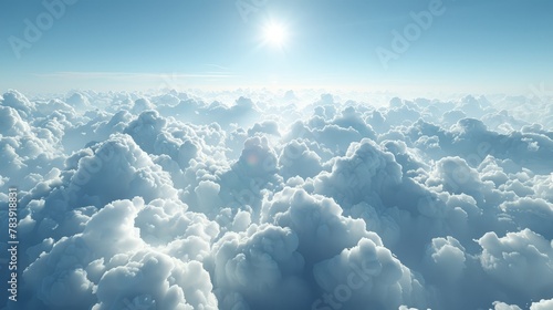  The sun shines through blue-tinted clouds, scattering light on white, fluffy ones in the foreground