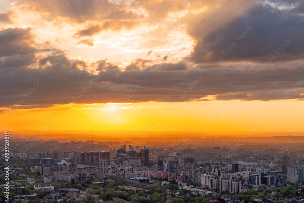 Aerial view of Kazakhstan's largest city Almaty at sunset on a spring evening