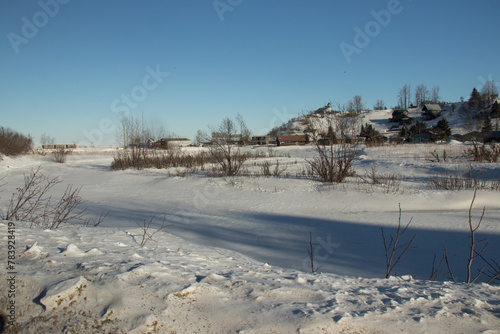 landscape with snow covered river