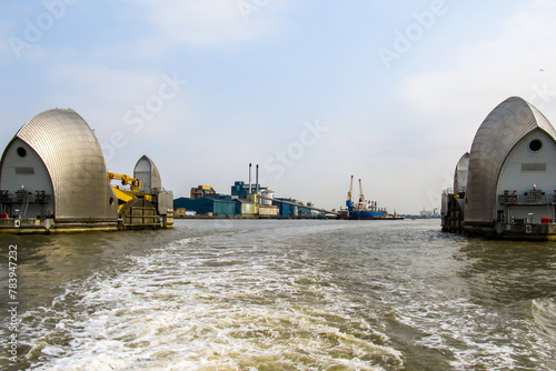 Looking through two of the steel clad shells off the Thames Barrier in its open position, Silvertown, UK photo