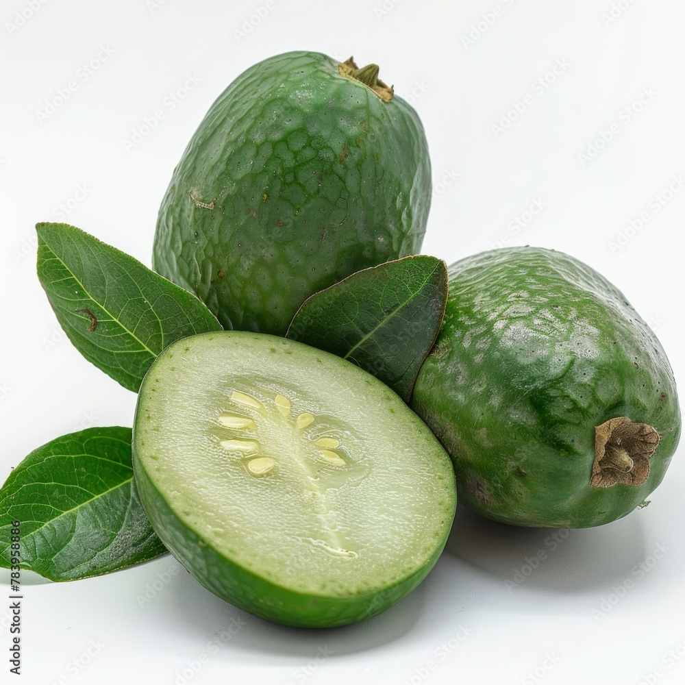 Feijoa cut with leaves isolated on white background