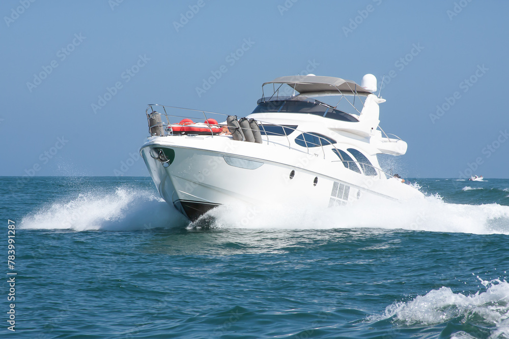 Fototapeta premium White yacht sailing in a calm sea