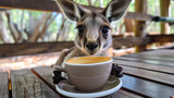 A baby kangaroo is holding a white coffee cup in its mouth. scene is playful, lighthearted, the kangaroo seemingly enjoying the experience of holding the cup. baby kangaroo bringing a cup of coffee