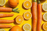 Circle of Carrots, Oranges, and Lemons on Yellow Background Fresh and Vibrant Fruit and Vegetable Arrangement