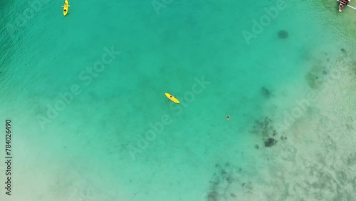 Woman Kayaking and Exploring the Natural Sights Around El Nido