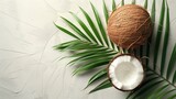 Exotic Food Background. Hyper-Realistic Coconut on Textured White Surface with Palm Leaves.