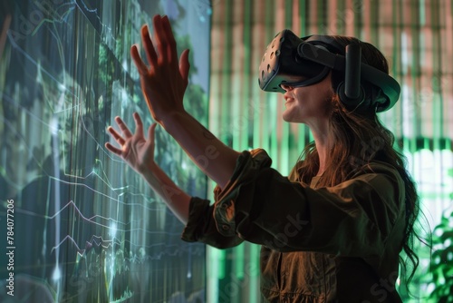 A woman wearing VR goggles is seemingly touching and interacting with virtual graphics