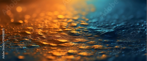 Warm golden tones dominate this close-up of refreshing water droplets, conveying a sense of purity and tranquility