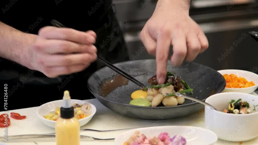 Culinary Mastery: Chef Preparing Gourmet Food at a Commercial Kitchen - 4K Video Culinary Mastery: Chef Preparing Gourmet Food at a Commercial Kitchen - 4K Video