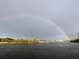 Rainbow over Corrib river with Galway city in background, Ireland, Irish nature