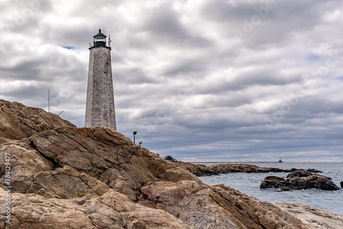Spring photo of Five Mile Point Lighthouse AKA Old New Haven Harbor Lighthouse, in New Haven, CT, on a cloudy day.