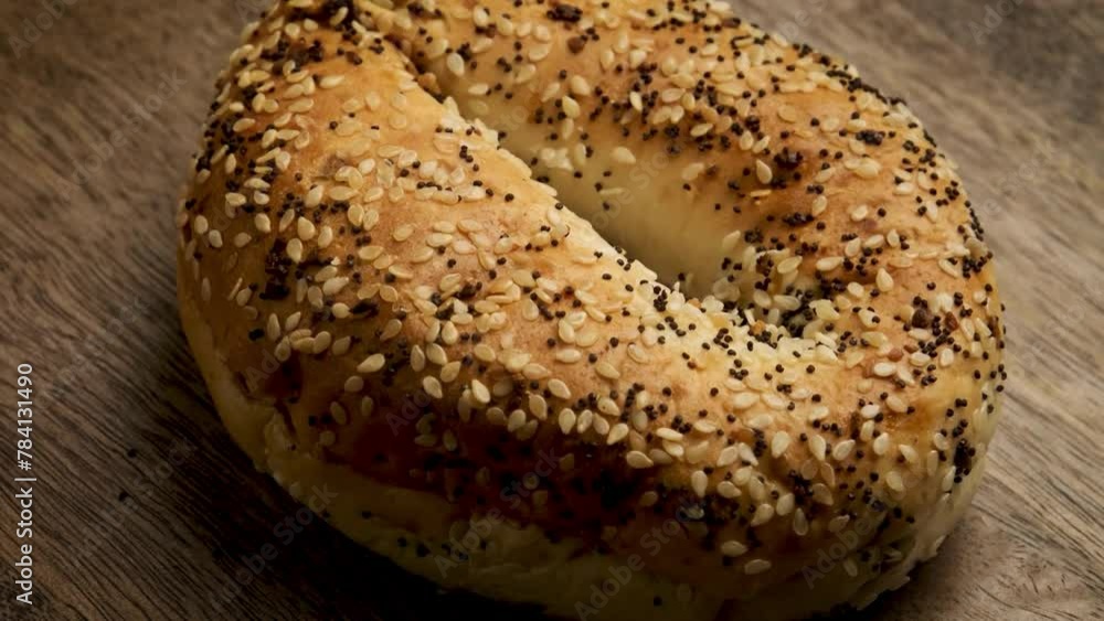 Seedy Delight: Sliced Organic Bagel with Seeds in 4K video Seedy Delight: Sliced Organic Bagel with Seeds in 4K video