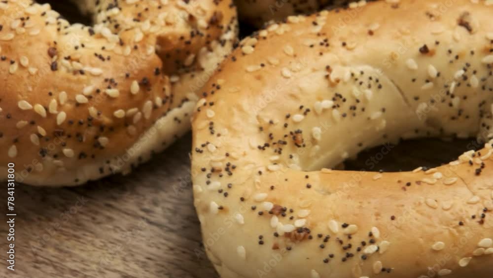 Seedy Delight: Sliced Organic Bagel with Seeds in 4K video Seedy Delight: Sliced Organic Bagel with Seeds in 4K video