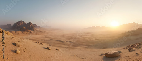 Panorama of beautiful a stone desert at sunrise in haze of soft sunlight  mountain landscape