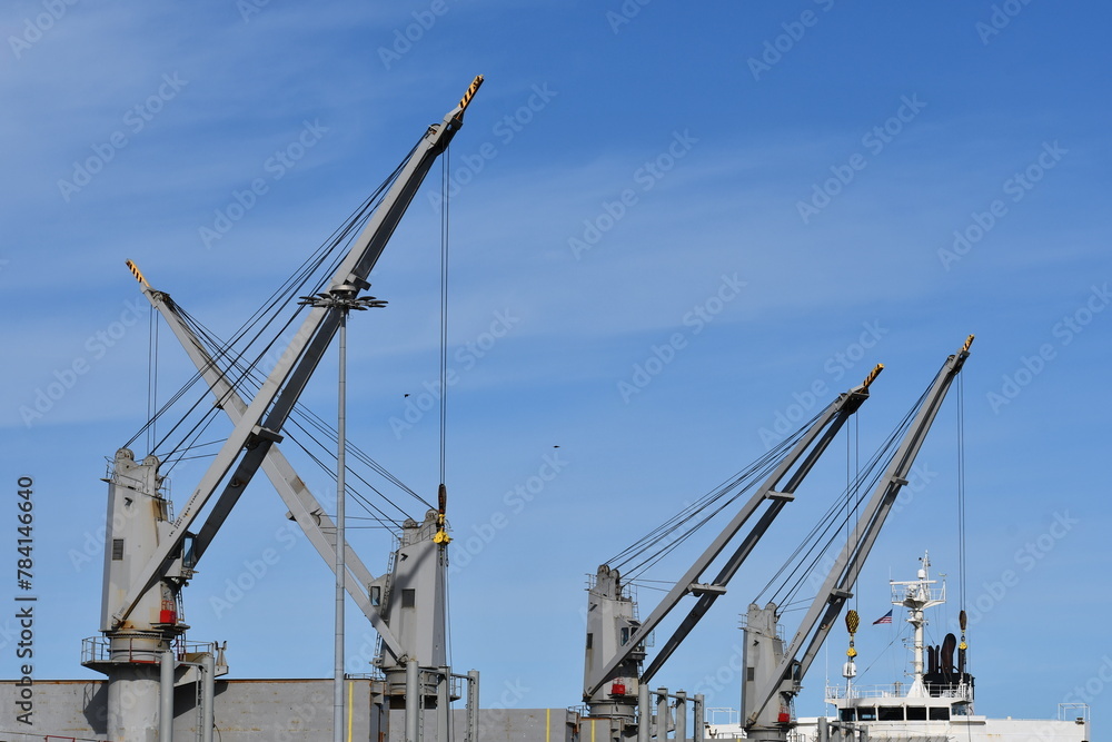Cranes on large freighter.