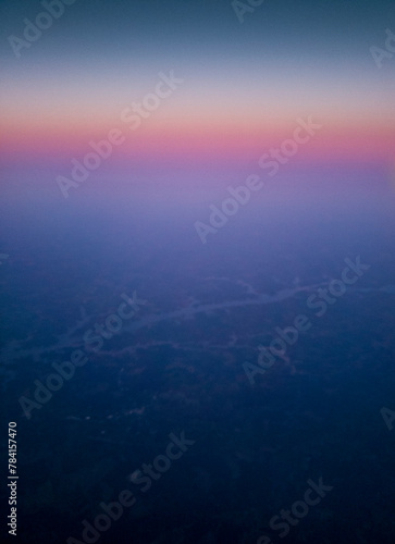 Man-made Lake Seen From an Airplane at Sunrise © Richard