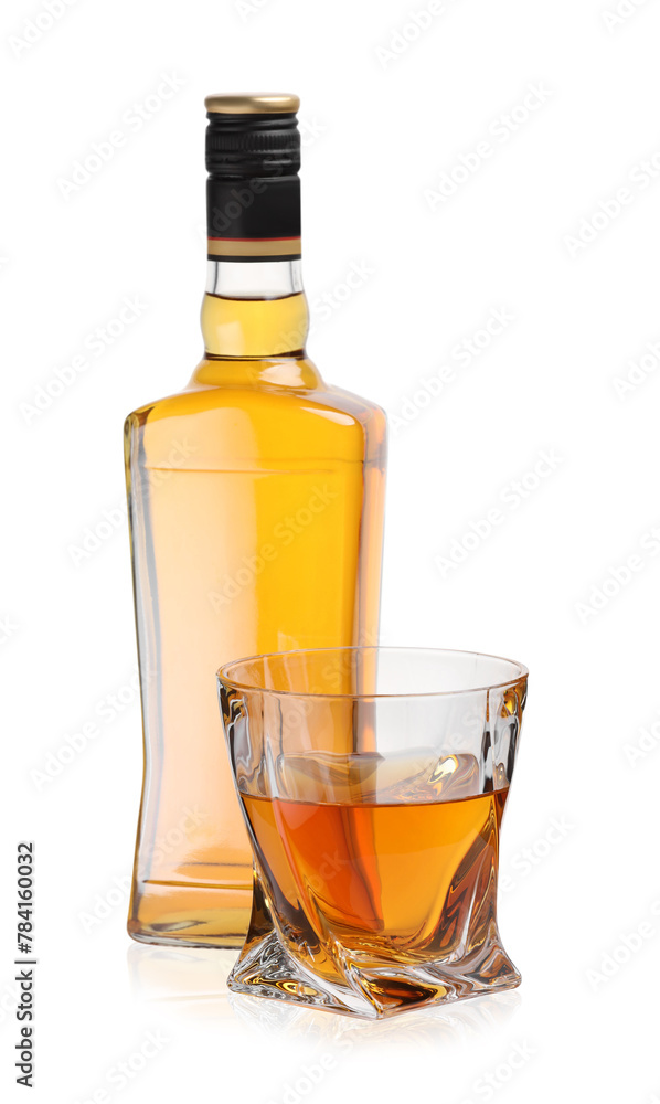 Glass and bottle of whiskey isolated on white Glass and bottle of whiskey isolated on white