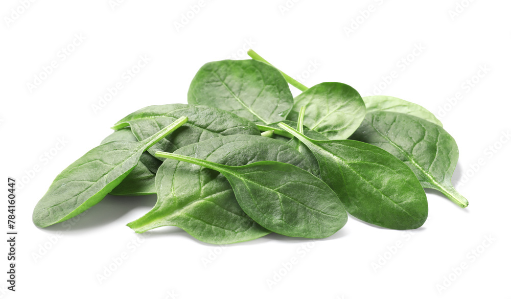 Pile of fresh spinach leaves isolated on white Pile of fresh spinach leaves isolated on white
