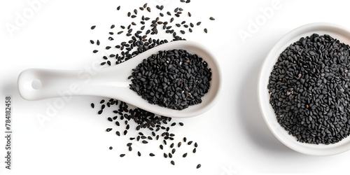 Black cumin seed in wooden bowl isolated on white background.  A pile of natural nigella sativa seeds, photo