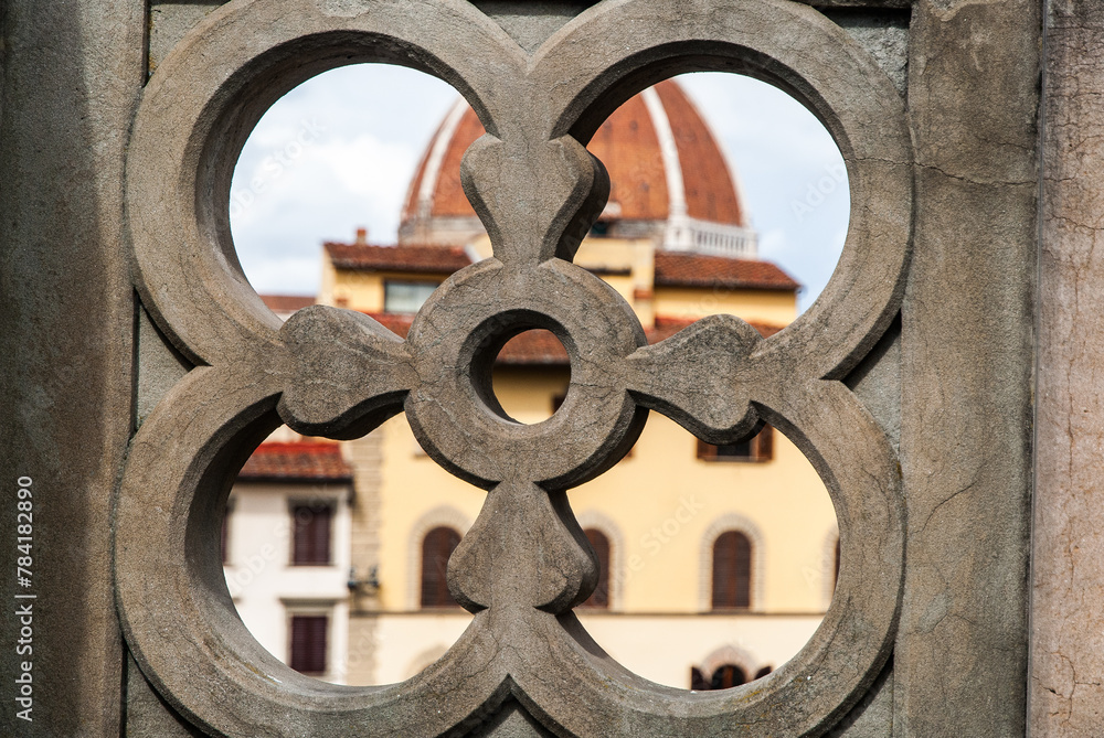 Florence, Italy - May 12 2013: Santa Maria del Fiore seeing from the flower grate window