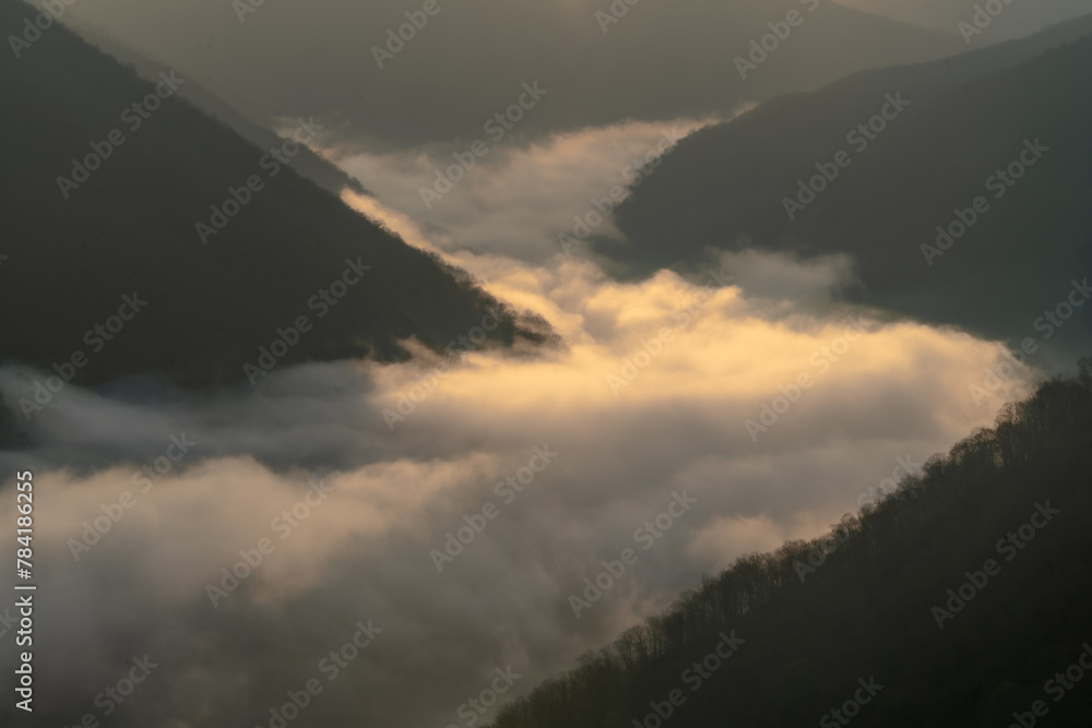 Fototapeta premium clouds over the mountains