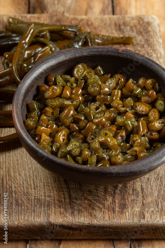 Chilean Australin peruvian seaweed COCHAYUYO. Choped cooked cochayuyo in bowl photo