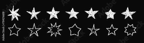 Hand Drawn Star Shapes. Grunge charcoal, crayon, pencil scrawl hand drawn stars, rough doodle shapes. Starry Elements in white color. (Full Vector) photo