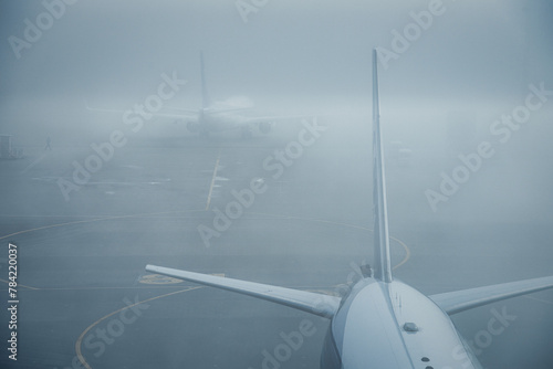 Photography Tokyo,Japan - April 8, 2024: An airport in the fog in the morning